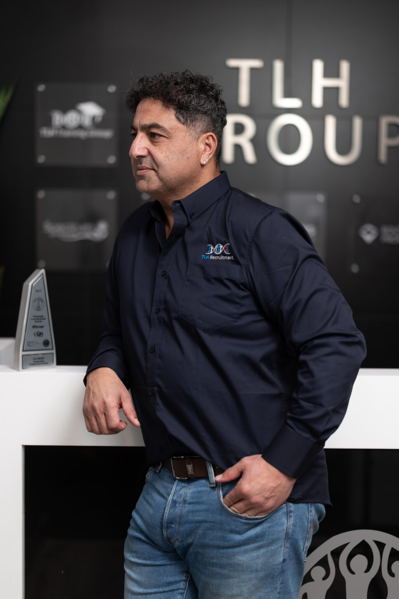 James Marroun standing confidently at TLH Group, showcasing his leadership in the recruitment industry.